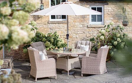 Bramblecrest Chedworth 4 Seat Round Outdoor Garden Dining Set with Parasol & Base - Sandstone