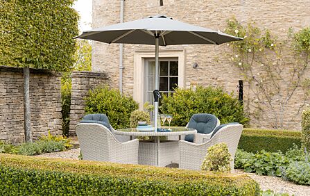 Bramblecrest Monterey Grey 4 Seater Round Dining Set with Parasol Bramblecrest Monterey Grey 4 Seater Round Dining Set with Parasol