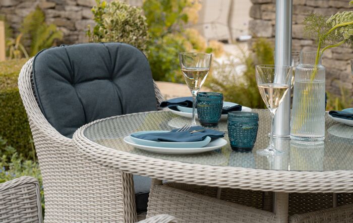 Bramblecrest Monterey Grey 4 Seater Round Dining Set with Parasol 