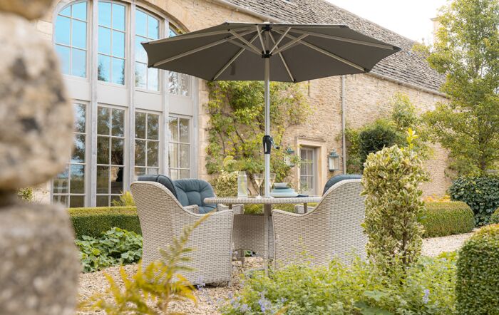 Bramblecrest Monterey Grey 4 Seater Round Dining Set with Parasol Bramblecrest Monterey Grey 4 Seater Round Dining Set with Parasol