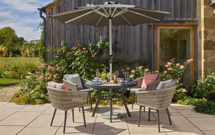 Bramblecrest Mauritius Round 4 Seat Dining Set with Parasol & Base