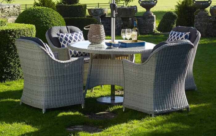 Bramblecrest Monterey Grey 4 Seater Round Dining Set with Parasol 